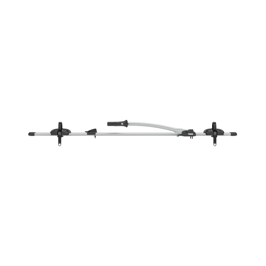 Side view of the Thule FreeRide bicycle roof rack in aluminum with the frame holder lowered.